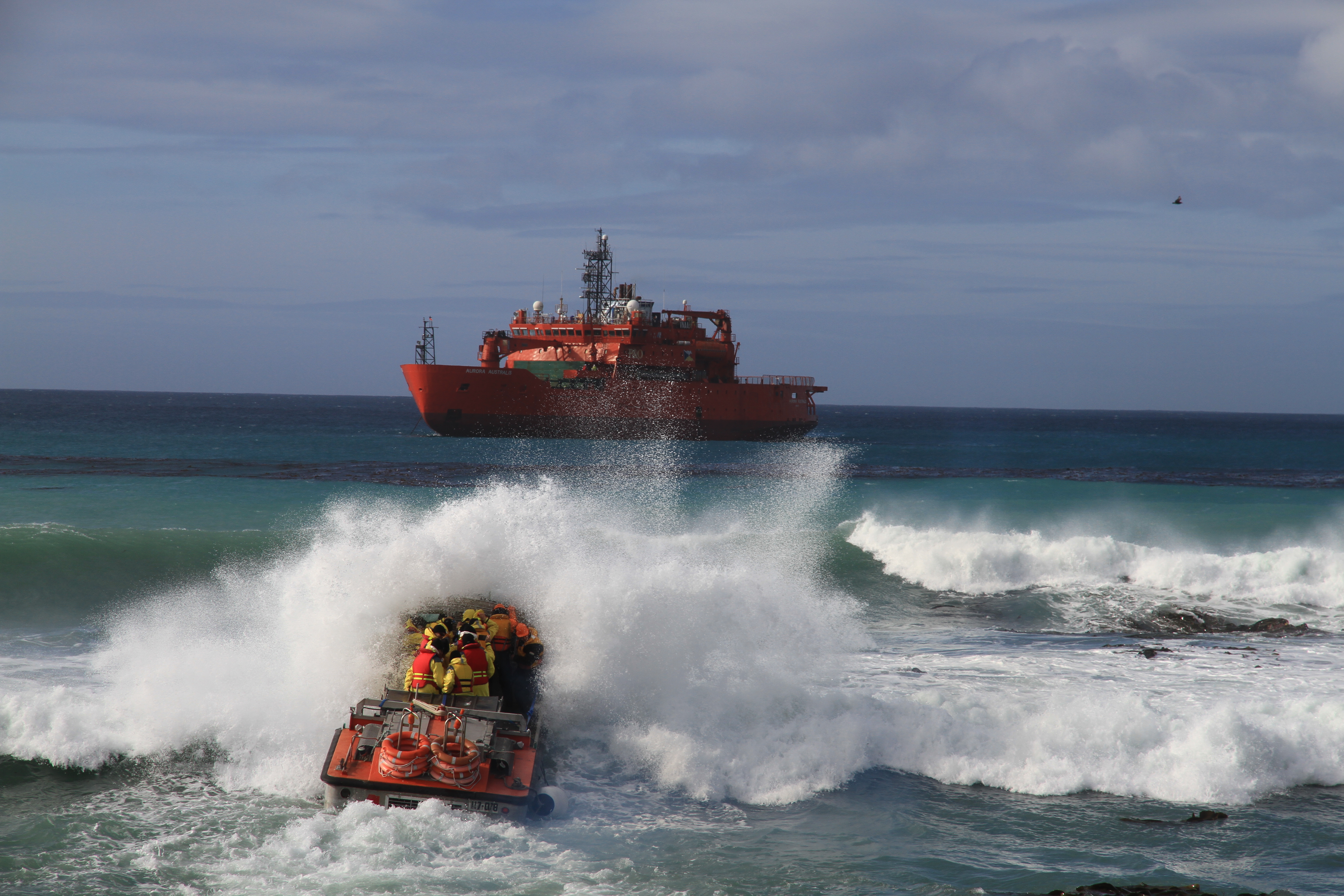  A supply vessel with FIDO team members aboard breaks waves in the Southern Ocean, departing Macquarie Island to return to the Aurora Australis. FIDO managed the Macquarie Island Cloud and Radiation Experiment (MICRE), a field campaign from 2016 to 2018 that gathered observations over a complete seasonal cycle. A supply vessel with FIDO team members aboard breaks waves in the Southern Ocean, returning to the Aurora Australis from Macquarie Island. FIDO managed the Macquarie Island Cloud and Radiation Experiment (MICRE), a field campaign from 2016 to 2018 that gathered observations over a complete seasonal cycle.
