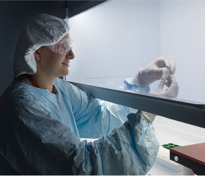 Technologist Allison Wende in a Laboratory clean room